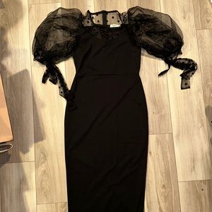 Black dress with puffed sleeves